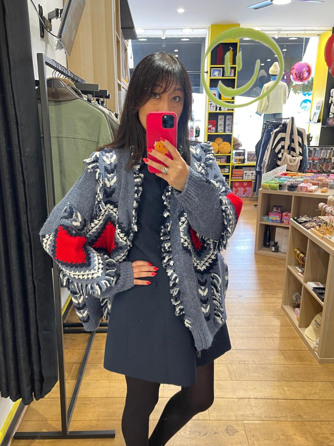 Gilet à franges bleu et rouge à motifs géométriques